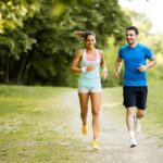Young couple running