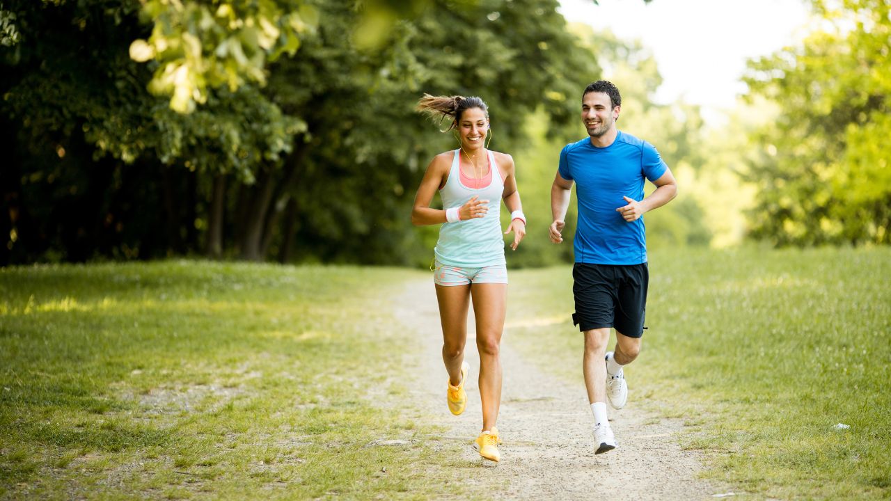 Young couple running